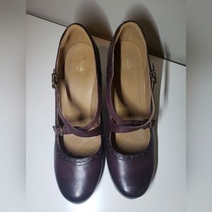 Burgandy leather 12W Mary Jane shoes with 3.5" heel and adjustable straps.